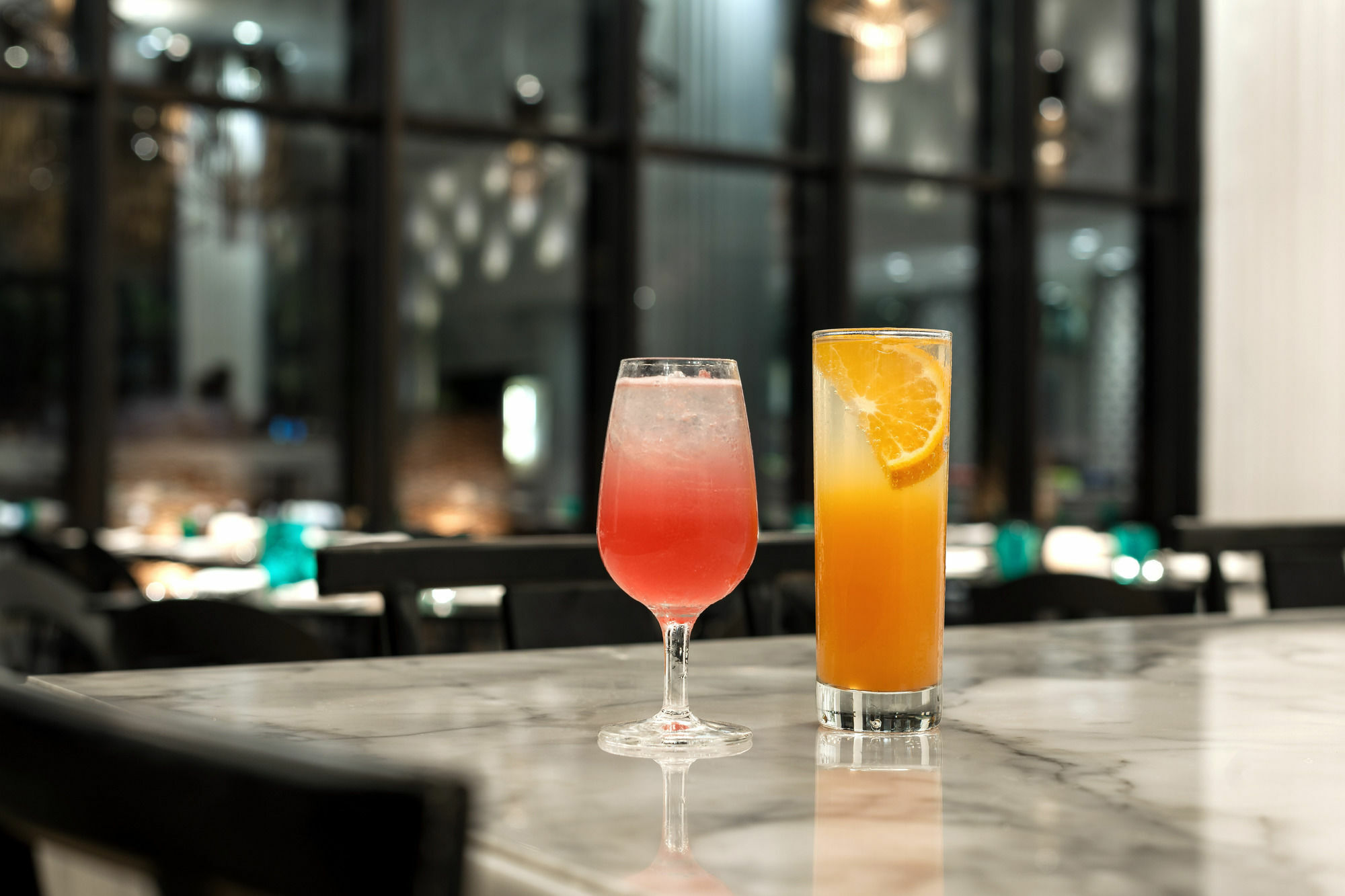 果阿坎多林中心凯悦酒店 外观 照片 A pink and an orange cocktail